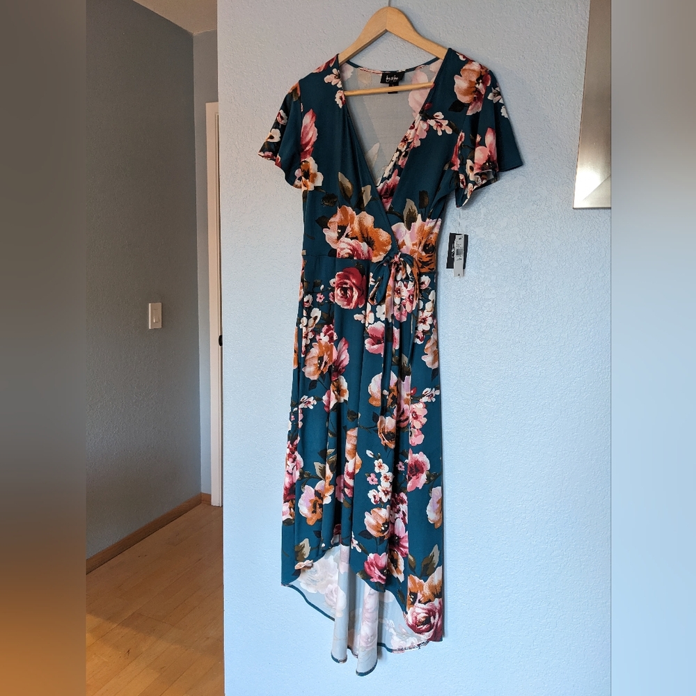 Teal floral hi-low, faux wrap dress. New with tags. Never worn. Size Lg